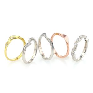 a group of stunning Contour Wedding Rings